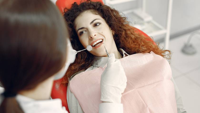 Patient undergoing orthodontic consultation for teeth spacing treatment